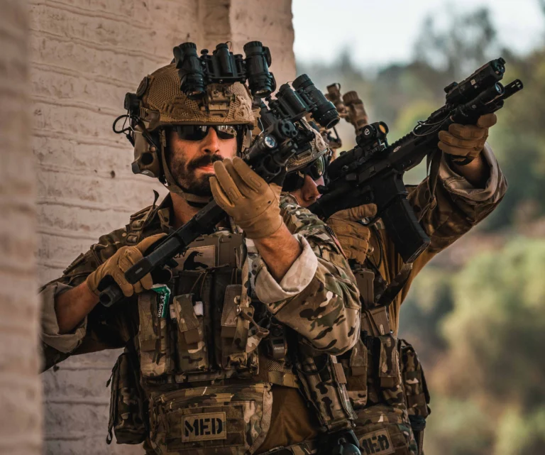 Ballistic safety glasses and tactical goggles displayed alongside military helmets for comparison of eye protection options. | Chase Tactical | Tactical Gear Ballistic Safety Glasses And Tactical Goggles Displayed Alongside Military Helmets For Comparison Of Eye Protection Options.